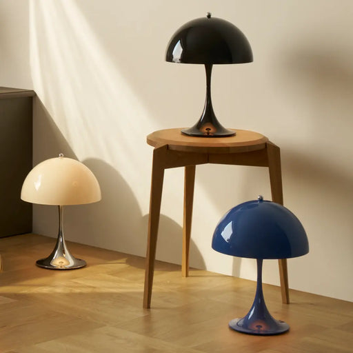 Panthella 250 Portable – Chrome Opal Beige (left) in a living room - MyConcept Hong Kong